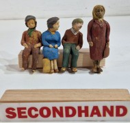 4 of figures 3 seated &1 Standing