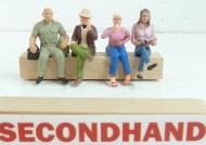 4 Seated Figures
